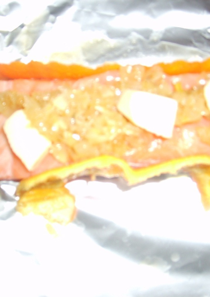 Una foto de Salmón en papillote con salsa de mejjillón