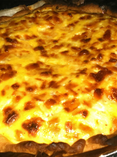 Una foto de Quiche de lacón, setas y mozzarella