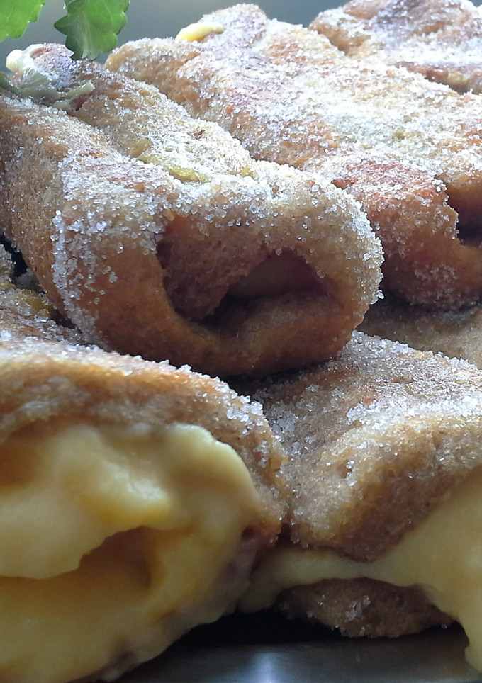 Una foto de Torrijas al Oporto con crema pastelera