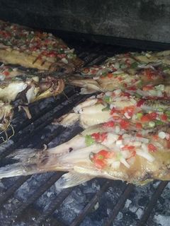 Una foto de Asado a la parrilla de pescado para caranchear