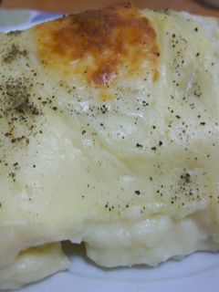 Una foto de Lasaña de arroz y marisco