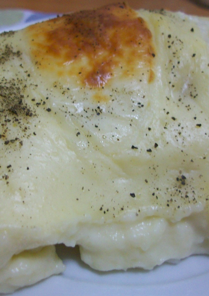 Una foto de Lasaña de arroz y marisco