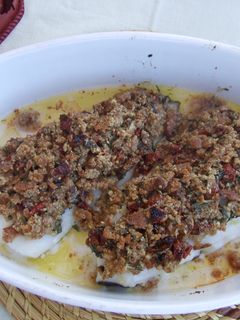 Una foto de Bacalao fresco con tomates secados al sol al aroma de lima