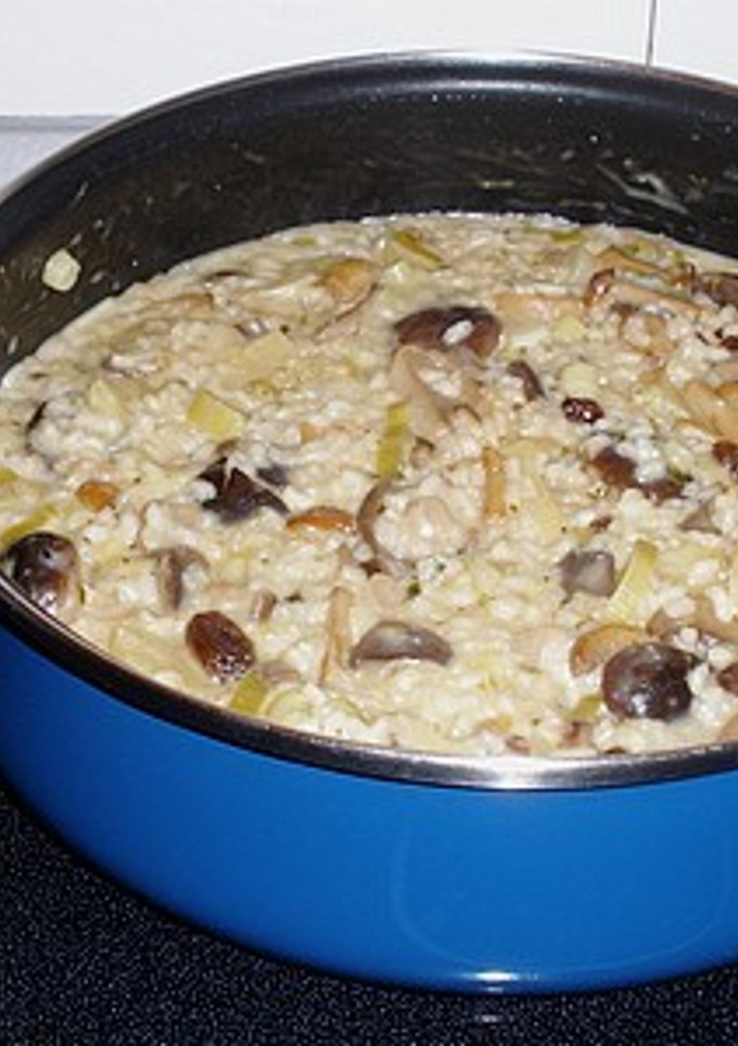 Una foto de Arroz con setas, piña y Gorgonzola