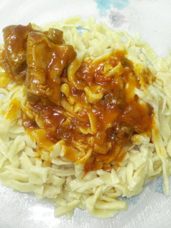 Una foto de Tallarines caseros con tuco y costillas de cerdo