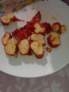 Una foto de Pimientos rojos rellenos de tortilla de patatas