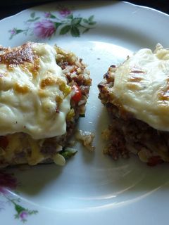 Una foto de Zapallitos rellenos de carne y arroz