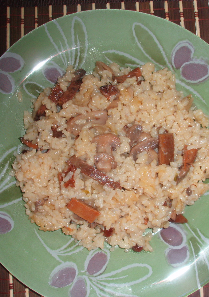 Una foto de Arroz con pasas y setas