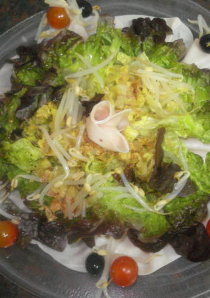 Una foto de Ensalada de hoja roble y pavo