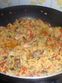 Una foto de Risotto con hongos al wok