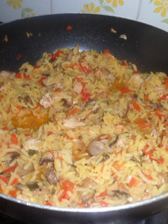 Una foto de Risotto con hongos al wok