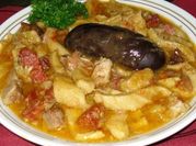 Una foto de callos con patas de cerdo