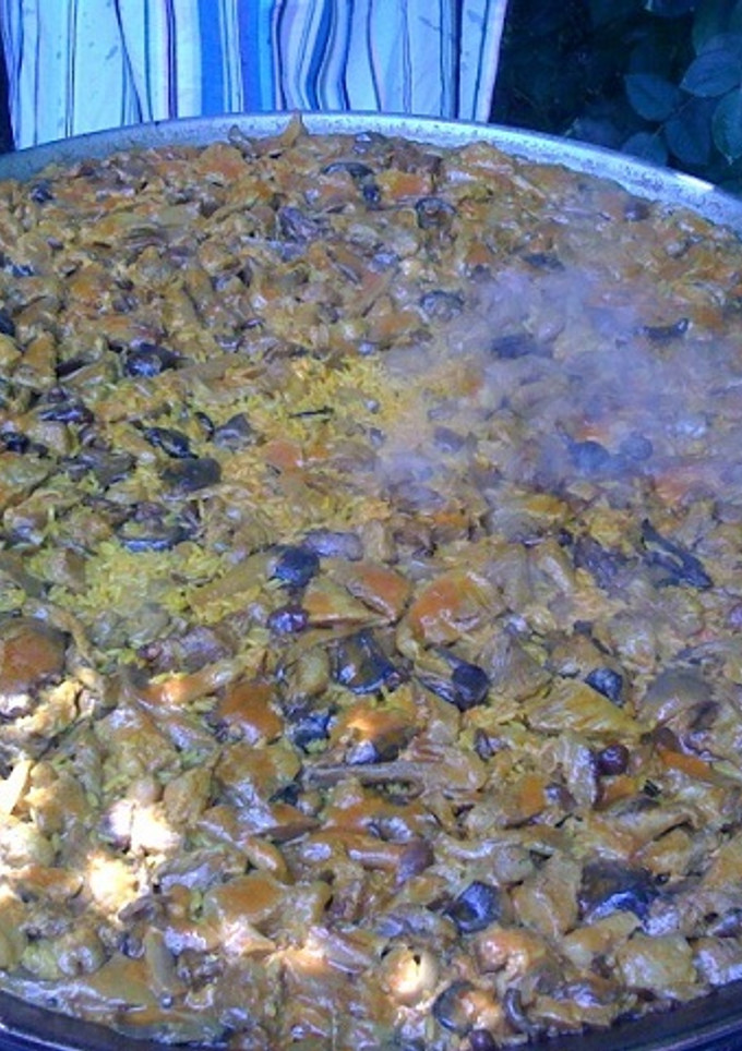 Una foto de Arroz con setas variadas, secreto ibérico y pluma ibérica