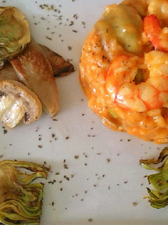 Una foto de Risotto de setas y gambas al curry