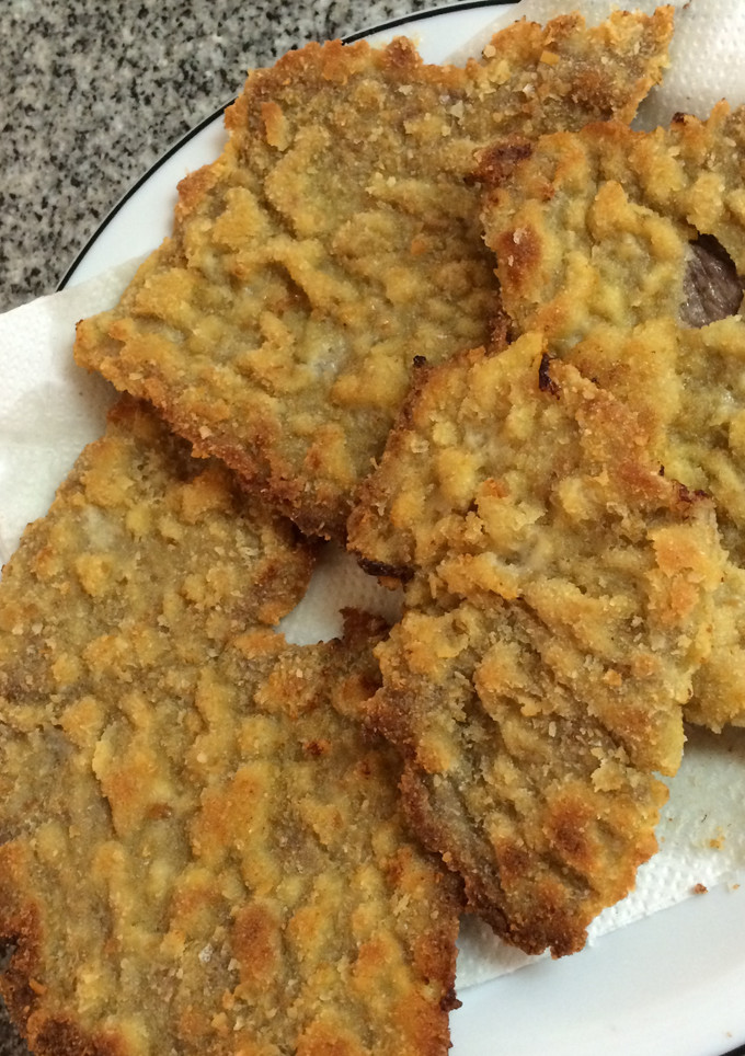 Una foto de Milanesas con papas fritas