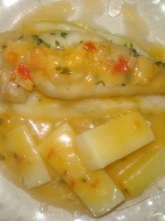 Una foto de Filetes de panga con patatas confitadas