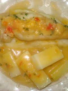 Una foto de Filetes de panga con patatas confitadas