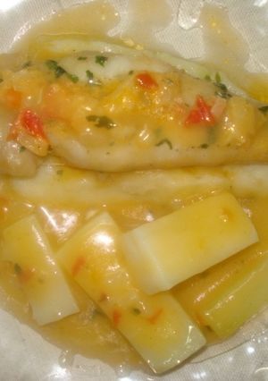 Una foto de Filetes de panga con patatas confitadas