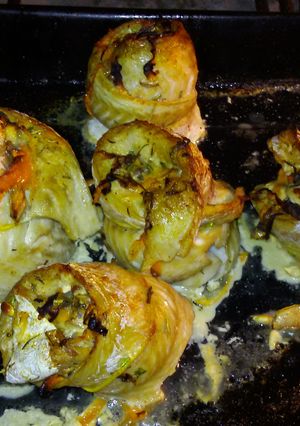 Una foto de Rolls de brótola en el horno de barro