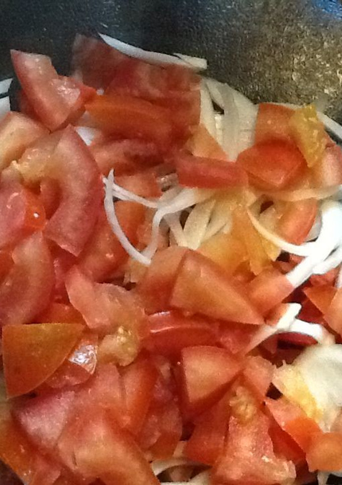 Una foto de Ensalada de tomate y cebolla