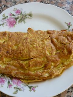 Una foto de Omelette de puré y queso