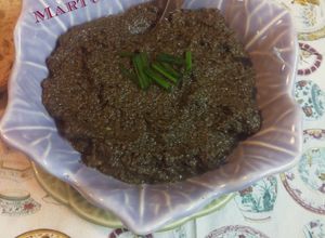 Una foto de Tapenade o patê de olivas