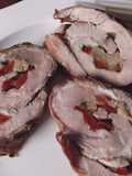 Rollo de falda de cerdo a las brasas