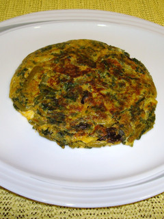Una foto de Tortilla de espinacas, judías verdes con sobresada