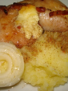 Una foto de Muslos de pollo al limón con bacon ahumado y queso crema