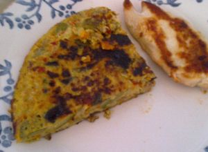 Una foto de Tortilla de zucchini y berenjena