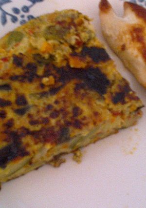 Una foto de Tortilla de zucchini y berenjena