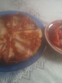 Una foto de Tortilla española a la pizza