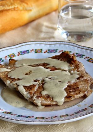 Una foto de Secreto ibérico con salsa de queso azul 