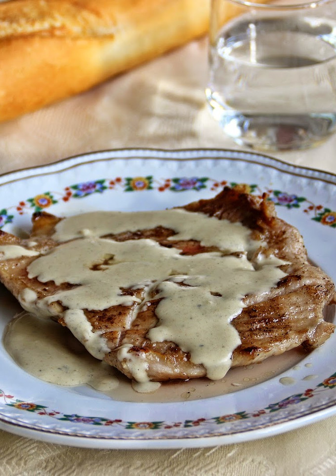 Una foto de Secreto ibérico con salsa de queso azul 