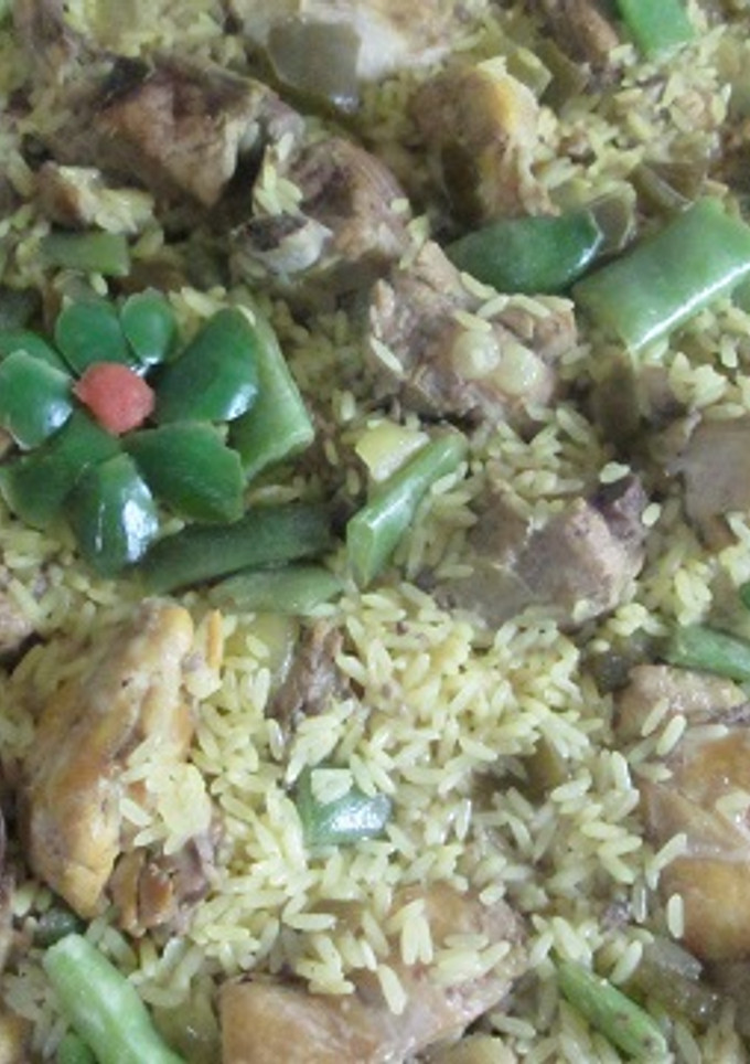 Una foto de Arroz a la cerveza con carne mixta