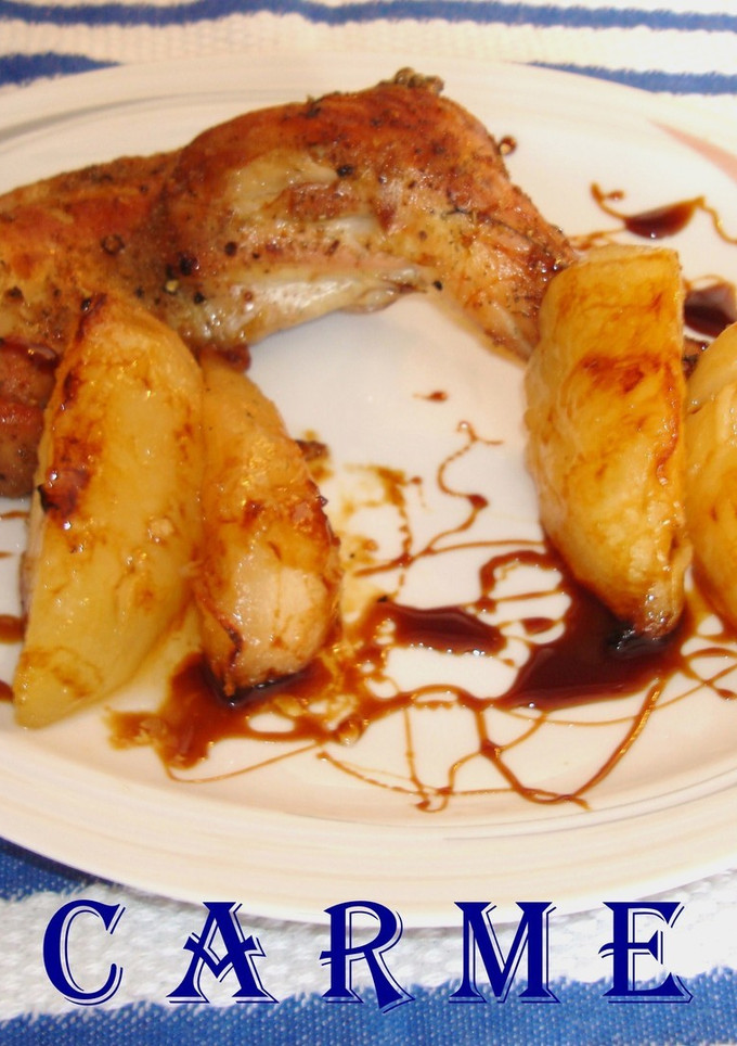 Una foto de Conejo asado con peras caramelizadas