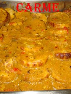 Una foto de Redondo de pavo relleno de bacon en salsa