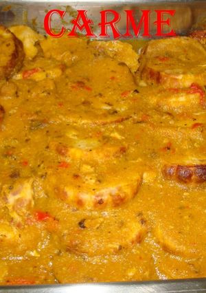 Una foto de Redondo de pavo relleno de bacon en salsa