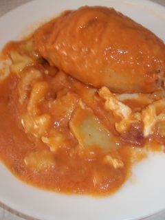 Una foto de Calamares en salsa con relleno de pelotas murcianas