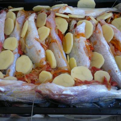 Bagres al horno con papas Receta de greisnm- Cookpad