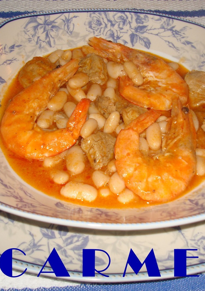 Una foto de Judias con langostinos