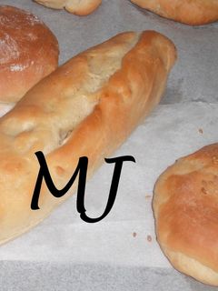 Una foto de Pan de hamburguesa con leche