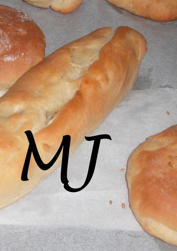 Una foto de Pan de hamburguesa con leche