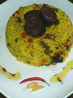 Una foto de Arroz con morcilla