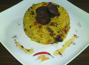 Una foto de Arroz con morcilla