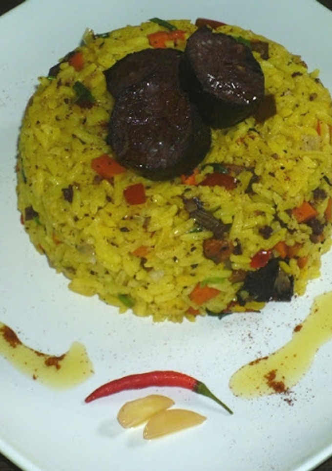 Una foto de Arroz con morcilla