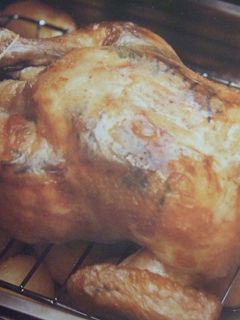 Una foto de Pollo relleno con salsa de mandarinas