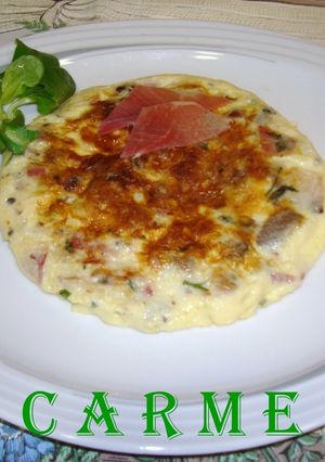 Una foto de Tortilla de revuelto de setas con jamón