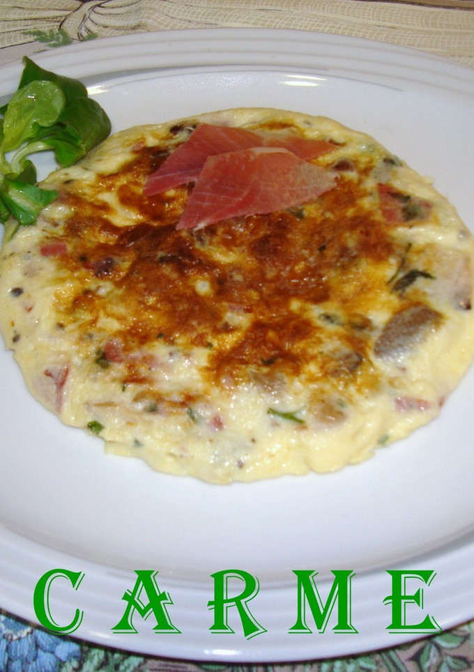 Una foto de Tortilla de revuelto de setas con jamón