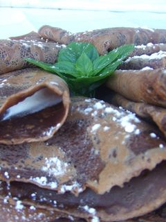 Una foto de Crepês de chocolate y café